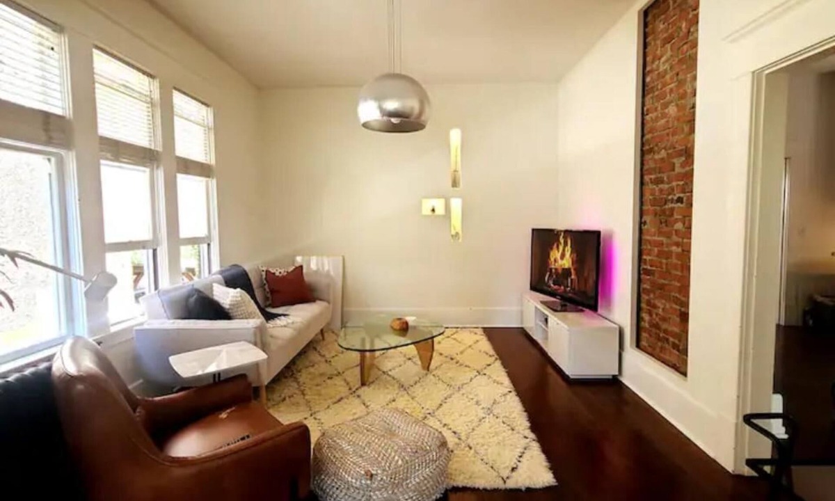 East Side House | Design Heritage Suite | Brick + Private Patio near Commercial Drive