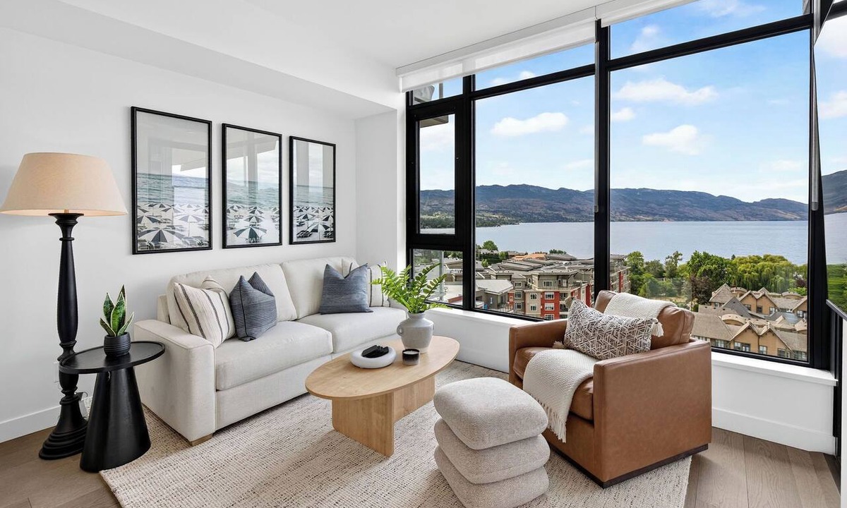 South Pandosy Condo | Experience luxury lakefront living at AQUA Kelowna. This elegant 1-bed retreat features a king suite & soa bed, spa-inspired bath, designer kitchen, and private patio with stunning Okanagan Lake views, plus resort pool/gym access.