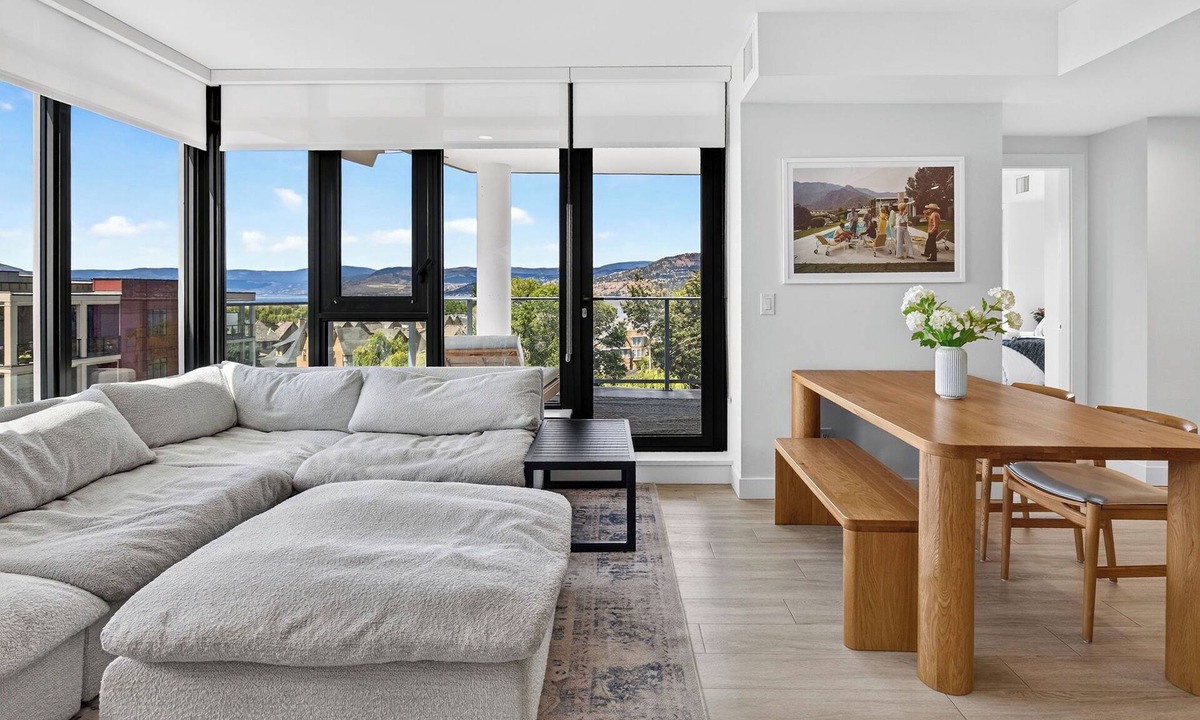 South Pandosy Apartment | Experience luxury waterfront living at Aqua Waterfront Village. This stylish 2BR, 2BA condo features designer interiors, two queen bedrooms, a spacious covered patio, chef's kitchen, and resort-style amenities just steps from Okanagan Lake.
