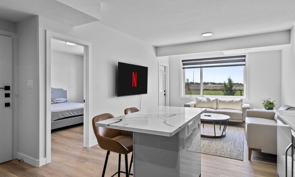 Leduc County House | Modern home-style space close to airport.