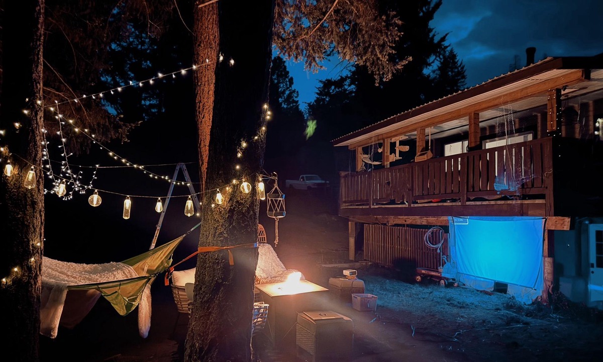 Merritt House | Nestled into the mountains, relax under the star in the hot tub