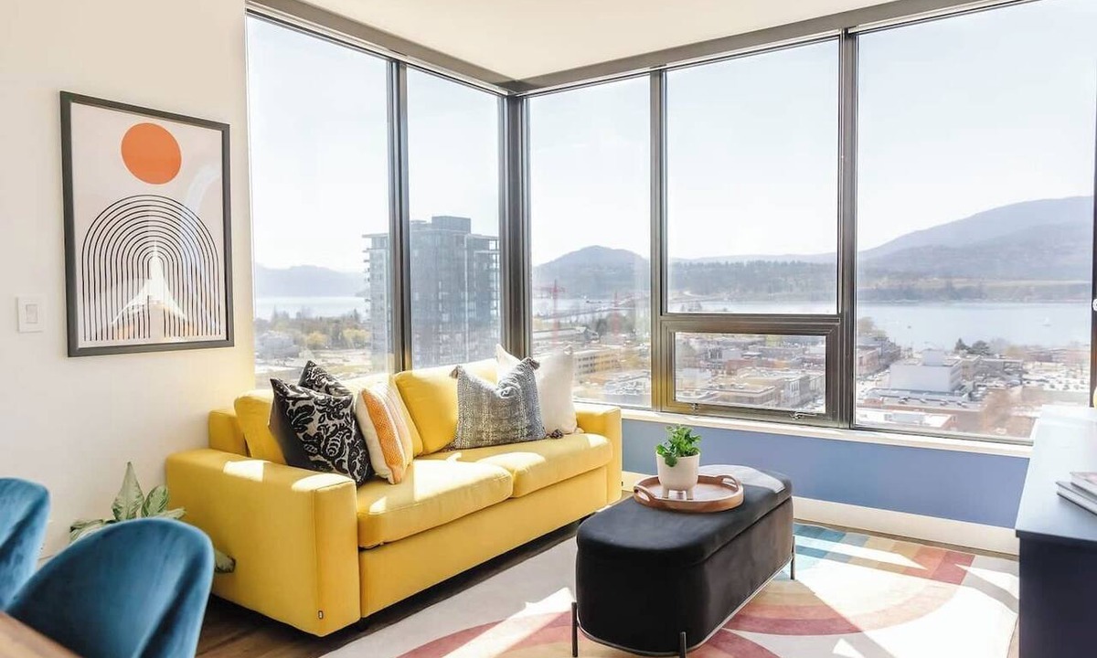 Downtown Kelowna Condo | Stay at The Retro Revival, a designer condo on the 16th floor of Brooklyn on Bernard. Enjoy panoramic lake/mountain views, curated retro decor, a balcony, rooftop terrace, and walkable access to Kelowna’s dining and waterfront.