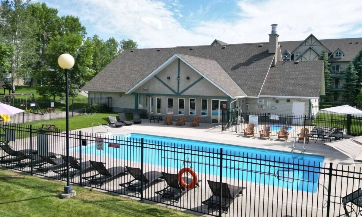 Radium Hot Springs Condo | The Radium Rise | Outdoor Pool/Hot Tub | Balcony