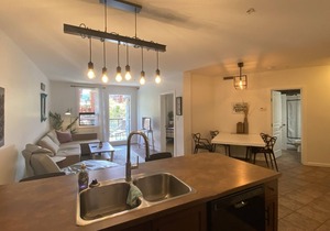 1 bedroom with enclosed den overlooking quiet courtyard (sleeps 7)