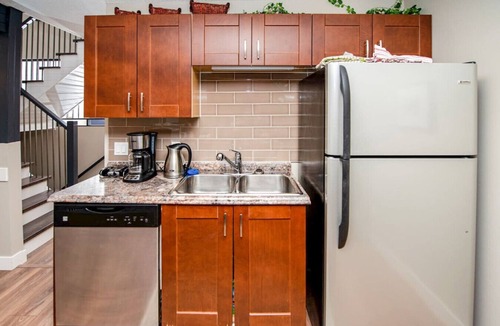 East Kootenay Apartment | 3BR Oasis with Private Hot Tub & Sauna. Walk to Ski Hill