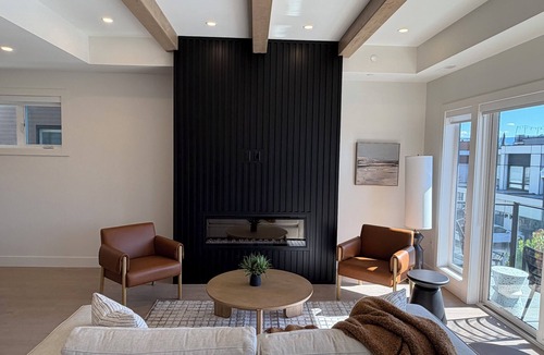 Central Okanagan House | 5 minutes to downtown Kelowna! Roof top patio with views of Okanagan Lake.