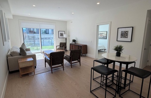 Central Okanagan House | 5 minutes to downtown Kelowna! Roof top patio with views of Okanagan Lake.