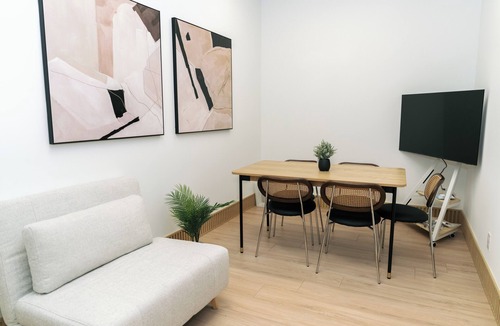 Fairview Apartment | Affordable Cozy Central Location Studio with Futon, 55' TV, Complementary Coffee