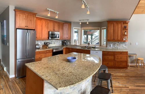 Silver Star Mountain Ski Chalet | Authentic Ski Chalet w/Gas Fireplace & Hot Tub backing onto Alpine Chairlift
