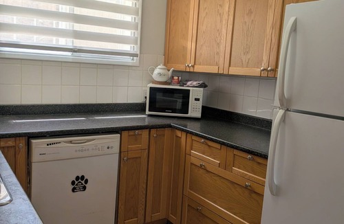 Okanagan-Similkameen House | Central 2 bedroom suite, full kitchen, living room with private entrance.