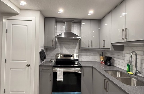 Calgary House | Cozy guest suite, walking trails
