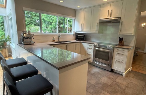 Canyon Heights House | Creekside oasis in Central North Vancouver neighborhood.