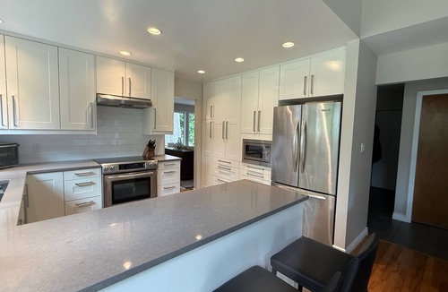 Canyon Heights House | Creekside oasis in Central North Vancouver neighborhood.