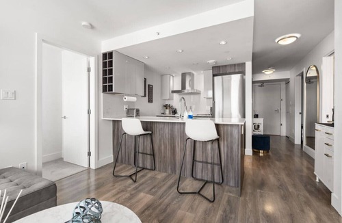 Southeast False Creek Apartment | Designer 2BR w/City Views| Prime Olympic Village