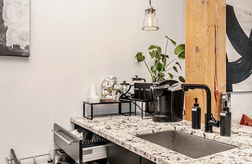 Downtown Edmonton Condo | Downtown Two-Level Loft | Private Gym + Parking | Steps From Roger’s Place