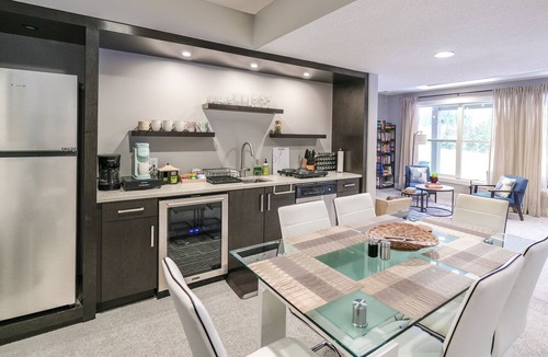 Division No. 11 House | Dream Family stay w/King Bed and Home Theatre! Large Backyard & Pet Friendly
