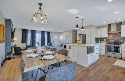 Southeast Edmonton House | Edmonton's Ultimate Family Hangout: Retro Arcade Garage + Private Hot Tub!