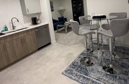 Southeast Calgary Condo | Elegant legal suite. Private entrance, queen bed, full kitchen, in-suite laundry