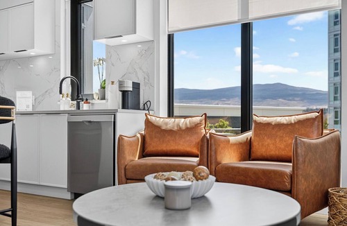 South Pandosy Condo | Enjoy a luxurious 2-bedroom retreat featuring two comfortable queen beds and a prime location just steps from Okanagan Lake. Perfect for a relaxing getaway with modern comforts and easy access to the beauty of the lake.