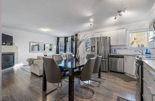 Southwest Calgary House | Evergreen Calgary Townhome — 3BR, Sleeps 6, Gas Fireplace, Free Parking