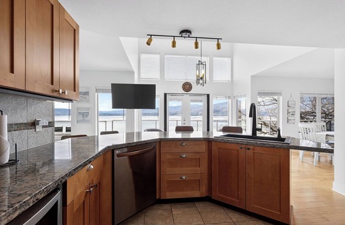 Westbank Condo | Experience West Kelowna’s heart! Minutes from Mission Hill & the Wine Trail. Whether you’re here for boating, golf, or a spa retreat, "Serenity Shore" is your perfect lakeside home base for exploring the best of the Okanagan.