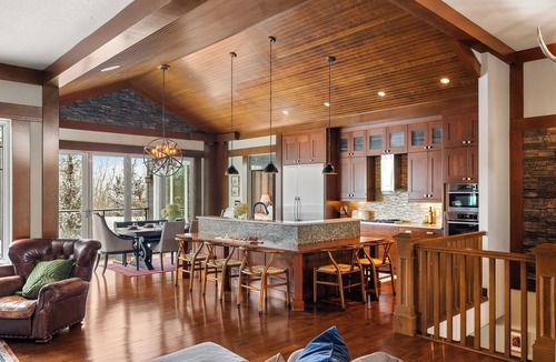 Southwest Edmonton House | Fortunato means "the fortunate one." This former Full House Lottery Dream Home has a private theatre, spa bathroom with soaker tub & heated towel drawer, a wine room, double sided fireplace & a full bar. Lodge luxury in Windermere.