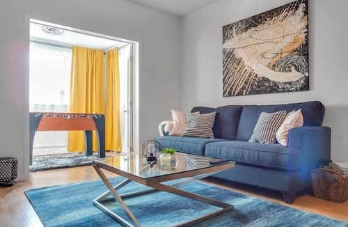 Beltline Apartment | Fun and Colourful Condo w Foosball Parking Coffee