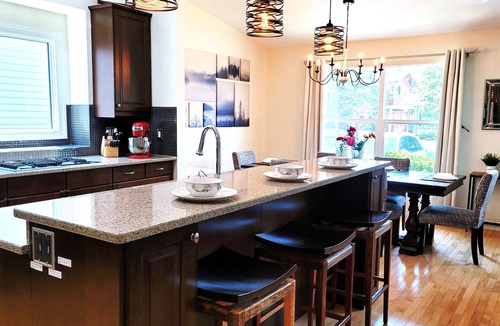 Northwest Calgary House | Luxury 5BR Retreat | 2 King Beds | Theater | Hot Tub | Game Room | Play Room