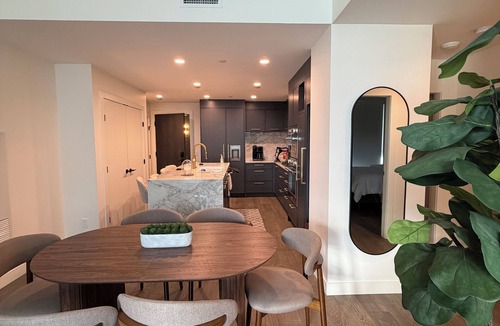 South Pandosy Condo | Luxury Lakefront Retreat | Beach, Pool, Hot Tub & Stunning Sunsets