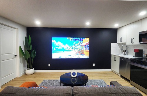 Southeast Calgary Apartment | Modern Suite in Seton - King Bed, 85" TV, Near South Health Campus & YMCA