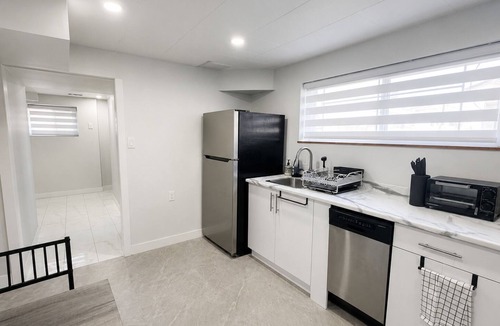 Killarney House | Newly renovated private basement Suite - central hub