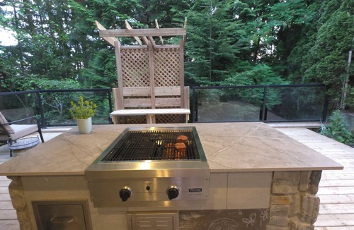 Upper Lonsdale House | Private Creekside Garden Suite - Patio, Deck, BBQ & Free Parking. Pet Friendly.