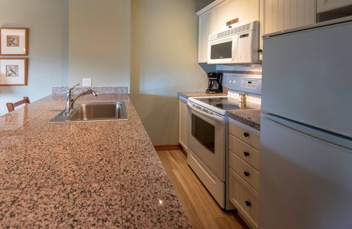 Whistler Condo | Slopeside Ski In/Out, Mountain Views | Pool and Hot Tub in Whistler | WiFi & Calling in NA