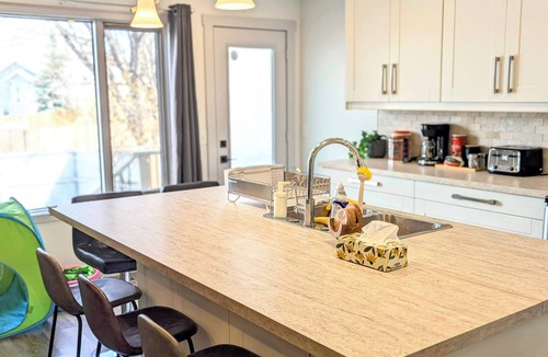 Southeast Calgary House | Spacious 4BR Family Retreat with Huge Park-Like Yard | Shops & Holiday Ready!