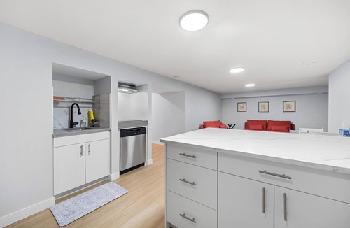 Montgomery House | Spacious basement 2 bedroom suite with private kitchenette and bathroom