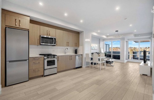 Kensington Condo | Stampede! 2BR w Kids Den, FREE Banff Pass