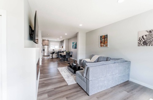 Southwest Calgary House | Stylish 3BR Home With A/C | Fast Wifi | Garage Parking | Sleeps 10