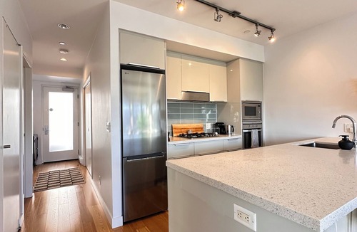 Chinatown Apartment | Stylish downtown penthouse with private rooftop patio and stunning views