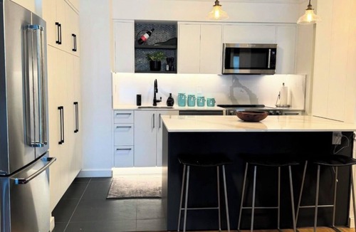 Lower Lonsdale Condo | Stylish Fully Renovated Oceanview Condo steps to Seabus & World Cup