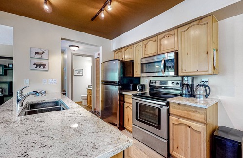 Village North House | Two-Story Mountain View Condo w/Gas Grill, Private Hot Tub, Fireplace, Free WiFi