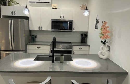 Central Okanagan House | Zen Living: Bright and Peaceful 1-Bedroom Unit