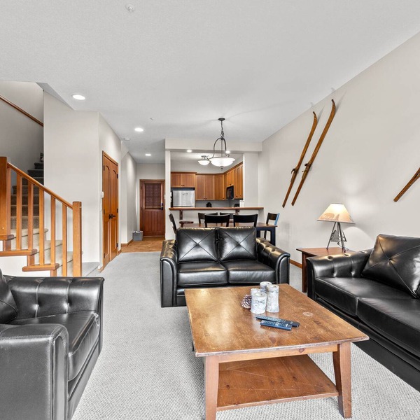 Exceptional multi level 2 bedroom +den townhouse with easy access to nearby runs and lift