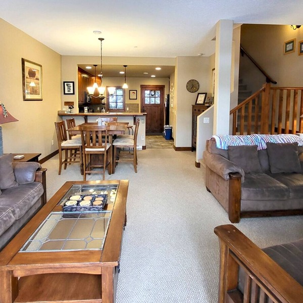 Incredible multi level 2 bedroom + den townhouse, close to ski run