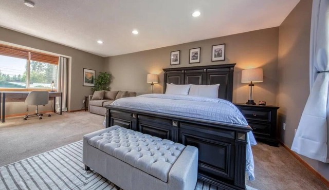 Entire 2596 sq ft house across parks, amenities, and the center of the Radium Hot Springs with a large fenced backyard.