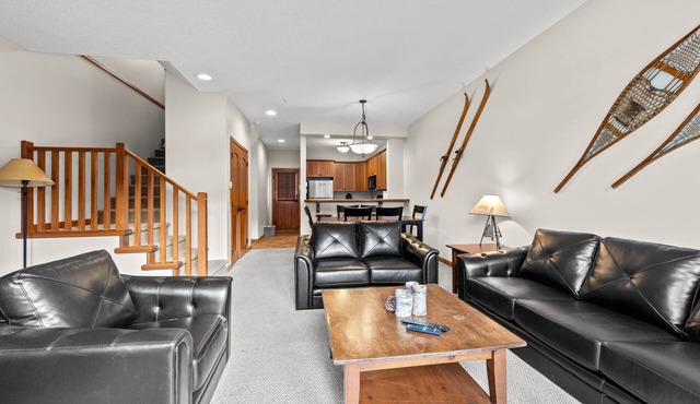 Exceptional multi level 2 bedroom +den townhouse with easy access to nearby runs and lift