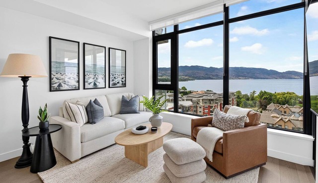 Experience luxury lakefront living at AQUA Kelowna. This elegant 1-bed retreat features a king suite & soa bed, spa-inspired bath, designer kitchen, and private patio with stunning Okanagan Lake views, plus resort pool/gym access.