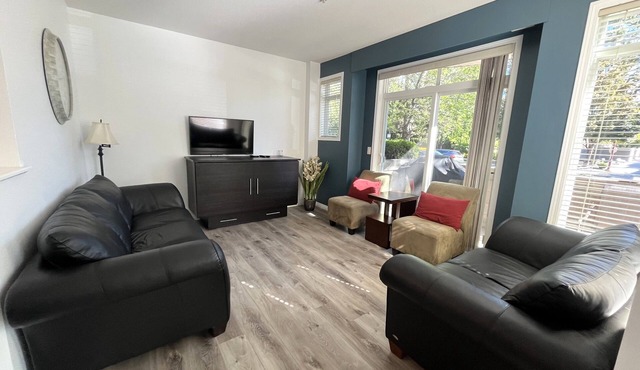 Ground Floor Walk out Downtown Kelowna by the Lake!