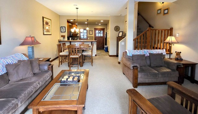 Incredible multi level 2 bedroom + den townhouse, close to ski run
