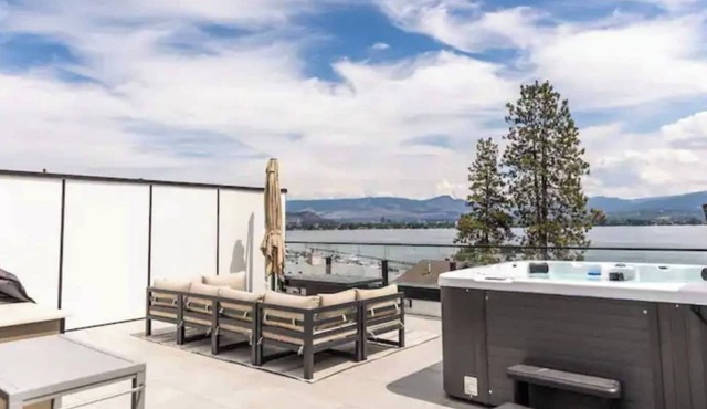 Luxury 4-bed, 3.5-bath home in Shelter Bay, West K, rooftop deck with hot tub.