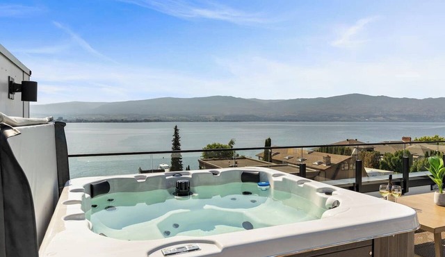 Luxury 4-bed, 3.5-bath home in Shelter Bay, West K, rooftop deck with hot tub.